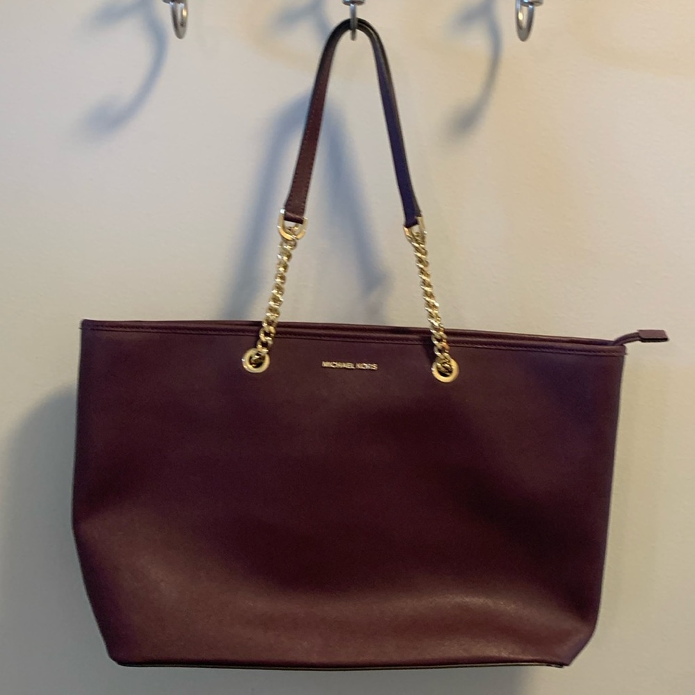 Plus and gold Michale Kors laptop bag